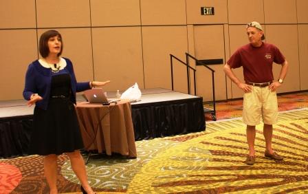 ASAE President John Graham, CAE (right) models a shorts, t-shirt and hat combo that is appropriate for a baseball game or boat day, but never appropriate for the office. 