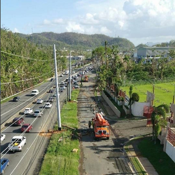 Trucks from the Kissimmee (Fla.) Utility Authority help restore power in Caguas, Puerto Rico after Hurricane Maria.