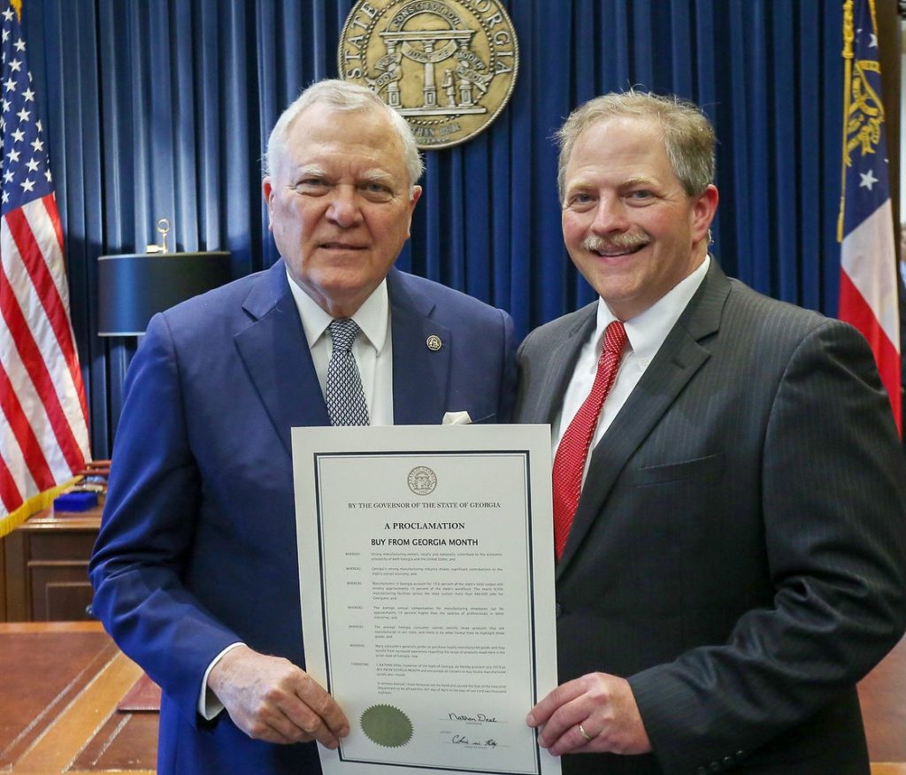 Georgia Governor Nathan Deal, left, and GMA Founder and CEO Jason Moss, right, on Buy From Georgia Day, June 20, 2018.
